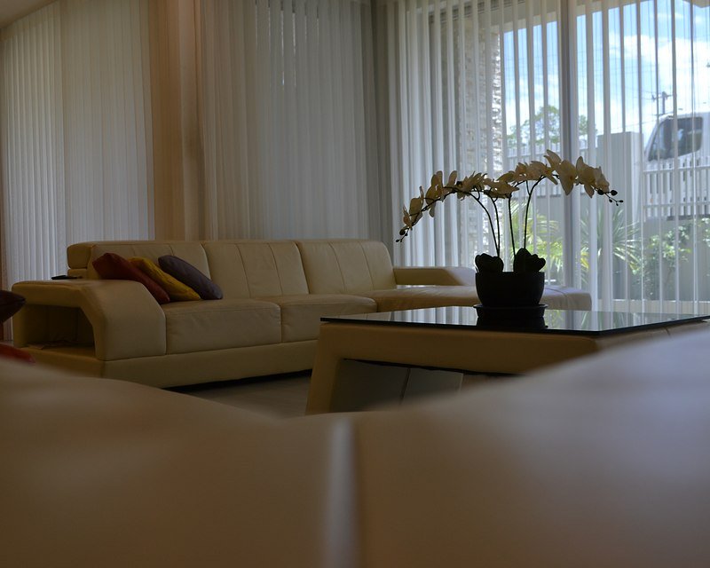 Made-to-measure sheer curtains in a Perth living room