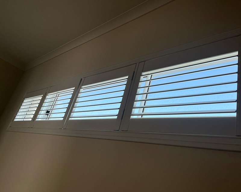 Plantation shutters on a Perth window